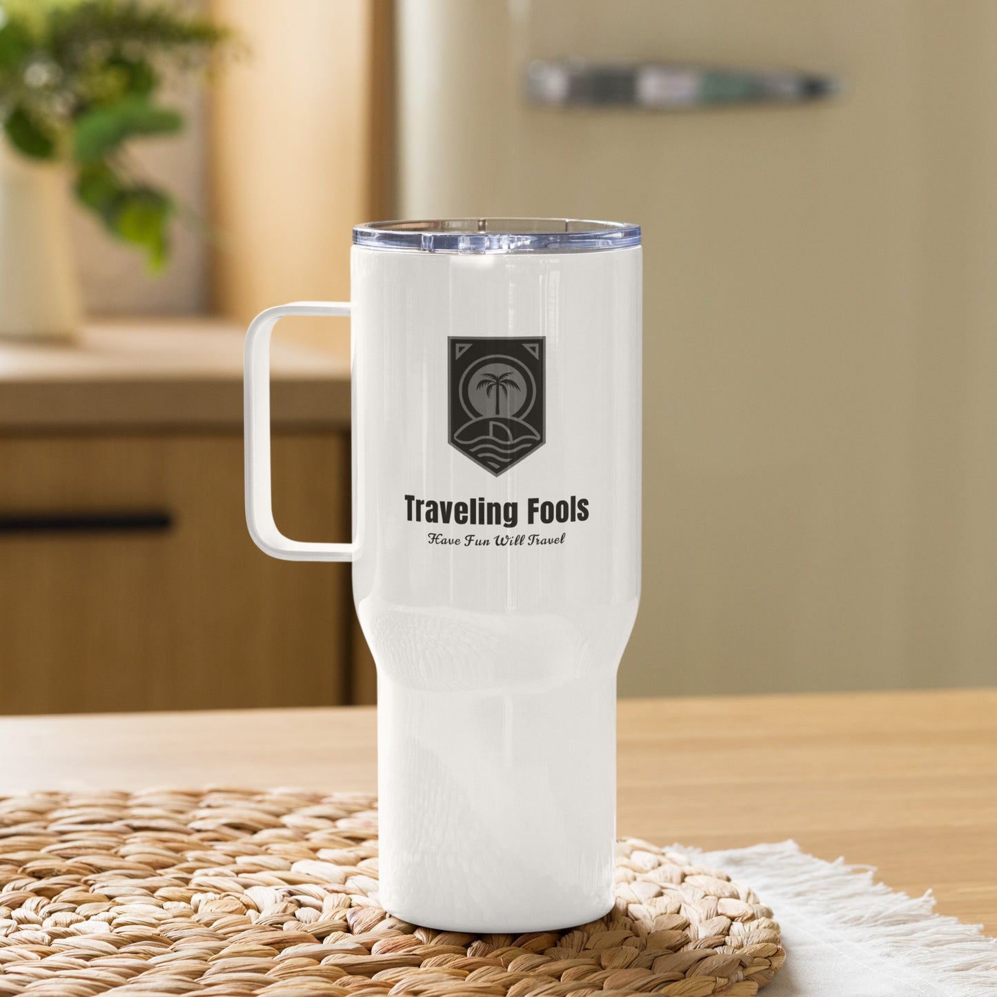 Traveling Fools Travel mug with a handle